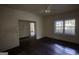 Open living room with hardwood flooring and natural light at 2228 Emory Sw St, Covington, GA 30014