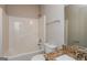 Bathroom with shower/tub combo, granite vanity, and hardwood style flooring at 7481 Absinth Dr, Atlanta, GA 30349