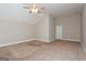 Spacious bedroom with neutral carpet and ceiling fan, ideal for a relaxing retreat at 7481 Absinth Dr, Atlanta, GA 30349