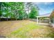 Spacious backyard with a covered patio and a play area for outdoor enjoyment at 1015 Buckeye Ln, Villa Rica, GA 30180