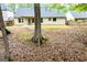 Large backyard with a covered patio offering relaxation and entertainment space at 1015 Buckeye Ln, Villa Rica, GA 30180