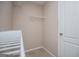 Walk-in closet with white wire shelving and neutral carpeted flooring at 1015 Buckeye Ln, Villa Rica, GA 30180
