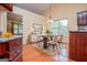 Staged dining area featuring vaulted ceilings and neutral colors at 1015 Buckeye Ln, Villa Rica, GA 30180