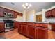 Kitchen island with seating and stainless steel appliances at 1015 Buckeye Ln, Villa Rica, GA 30180