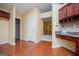 Spacious kitchen with hardwood floors and cherry cabinets at 1015 Buckeye Ln, Villa Rica, GA 30180