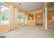 Bright living room with carpet, natural light, and view of dining area at 1015 Buckeye Ln, Villa Rica, GA 30180