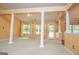 Bright living room with columns, windows, and carpet at 1015 Buckeye Ln, Villa Rica, GA 30180