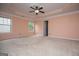 Unfurnished main bedroom with tray ceilings and carpeted floors at 1015 Buckeye Ln, Villa Rica, GA 30180