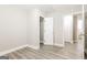 This bedroom features wood-look floors with a closet and adjoining room at 1427 Timms Se Cir, Atlanta, GA 30316