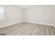 Well-lit bedroom featuring new floors, paint, and a window at 1427 Timms Se Cir, Atlanta, GA 30316