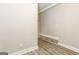 Hallway featuring new floors and freshly painted walls at 1427 Timms Se Cir, Atlanta, GA 30316