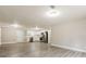 Spacious living room showcasing sleek floors and an open concept to the kitchen at 1427 Timms Se Cir, Atlanta, GA 30316