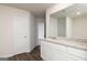 Bright bathroom featuring granite countertops, new cabinets, and modern fixtures at 240 Oliver Dr, Locust Grove, GA 30248