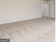 Spacious carpeted bedroom with large empty walls at 240 Oliver Dr, Locust Grove, GA 30248