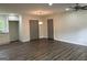 Open living and dining area with new floors, recessed lighting, and closet space at 132 N Johnson St, Bowdon, GA 30108