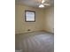 Clean bedroom with wall-to-wall carpet and a ceiling fan at 8672 Bowden St, Douglasville, GA 30134