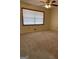 Spacious bedroom with plush neutral carpet and a ceiling fan at 8672 Bowden St, Douglasville, GA 30134