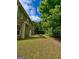 Exterior of home featuring a large backyard at 4832 Batiste Ln, Acworth, GA 30101