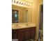 Bathroom featuring double sinks, a large mirror, and access to a separate toilet and shower area at 4832 Batiste Ln, Acworth, GA 30101