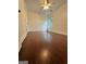 Spacious bedroom featuring hardwood floors and natural light from the window at 4832 Batiste Ln, Acworth, GA 30101