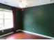 Bedroom featuring a window, ceiling fan, and hardwood flooring at 4832 Batiste Ln, Acworth, GA 30101
