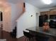Charming kitchen with granite counters, dark appliances, and island with seating at 4832 Batiste Ln, Acworth, GA 30101