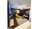 Stylish living room featuring modern decor, a fireplace, and dark accent walls, ideal for relaxing at 4832 Batiste Ln, Acworth, GA 30101