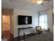 Bedroom with a ceiling fan, a large tv and natural light at 4832 Batiste Ln, Acworth, GA 30101