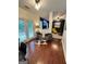 Cozy sitting area adjacent to living room with hardwood floors and glass pane doors at 4832 Batiste Ln, Acworth, GA 30101