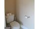 Close-up of toilet with fresh paper, in neutral, modern bathroom at 4832 Batiste Ln, Acworth, GA 30101