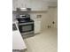 Spacious kitchen featuring a stainless steel oven and ample storage at 8660 Bowden St, Douglasville, GA 30134