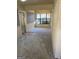 Spacious living room with neutral carpet, freshly painted walls, and bright natural light at 8660 Bowden St, Douglasville, GA 30134