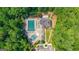 Aerial view of community pool and surrounding lush greenery at 8710 Gilmer Ft, Cumming, GA 30028