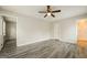 Spacious bedroom with new flooring, neutral walls, and ample natural light from large window at 543 Tahoe Cir, Stone Mountain, GA 30083