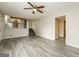 Open-concept living area with new flooring and a staircase leading to the upper level at 543 Tahoe Cir, Stone Mountain, GA 30083