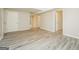 Room with wood-look flooring, white doors and trim, and neutral walls at 543 Tahoe Cir, Stone Mountain, GA 30083
