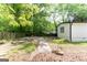 Backyard view of sidewalk to fence at 6532 Voyles Dr, Riverdale, GA 30274