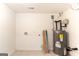 Unfinished basement area with a water heater at 6532 Voyles Dr, Riverdale, GA 30274