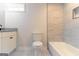 Bathroom featuring granite countertops, toilet, and tiled shower/tub at 6532 Voyles Dr, Riverdale, GA 30274