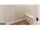 A simple, unfinished walk-in closet with a small built-in shelf at 6532 Voyles Dr, Riverdale, GA 30274