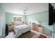 Relaxing bedroom with light green walls, plush bedding, and ample storage space at 95 Blue Grass Ct, Oxford, GA 30054