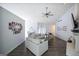 Inviting living room with elegant decor, a fireplace, and wood flooring at 95 Blue Grass Ct, Oxford, GA 30054