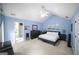 The main bedroom features a vaulted ceiling, neutral carpet, and an ensuite bathroom at 95 Blue Grass Ct, Oxford, GA 30054