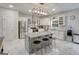 Modern kitchen with granite countertops, stainless steel appliances, and a center island at 1017 Preserve Park Dr, Loganville, GA 30052