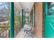 Inviting covered porch with plenty of space for outdoor seating and relaxation at 693 Trailwood Dr, Riverdale, GA 30274