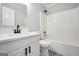 The bathroom has a new vanity, black faucet and a shower/tub combo at 138 Sam Solomon Rd, Locust Grove, GA 30248