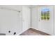 The mud room has two entry doors and a hanging rack at 138 Sam Solomon Rd, Locust Grove, GA 30248