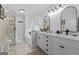 Spa-like bathroom with double sinks, a soaking tub, and glass-enclosed shower at 614 Highway 85 Conn, Brooks, GA 30205