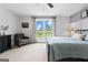 Bright bedroom featuring a scenic view and neutral decor at 614 Highway 85 Conn, Brooks, GA 30205