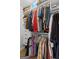 Walk-in closet with custom shelving and ample storage space for clothes at 614 Highway 85 Conn, Brooks, GA 30205